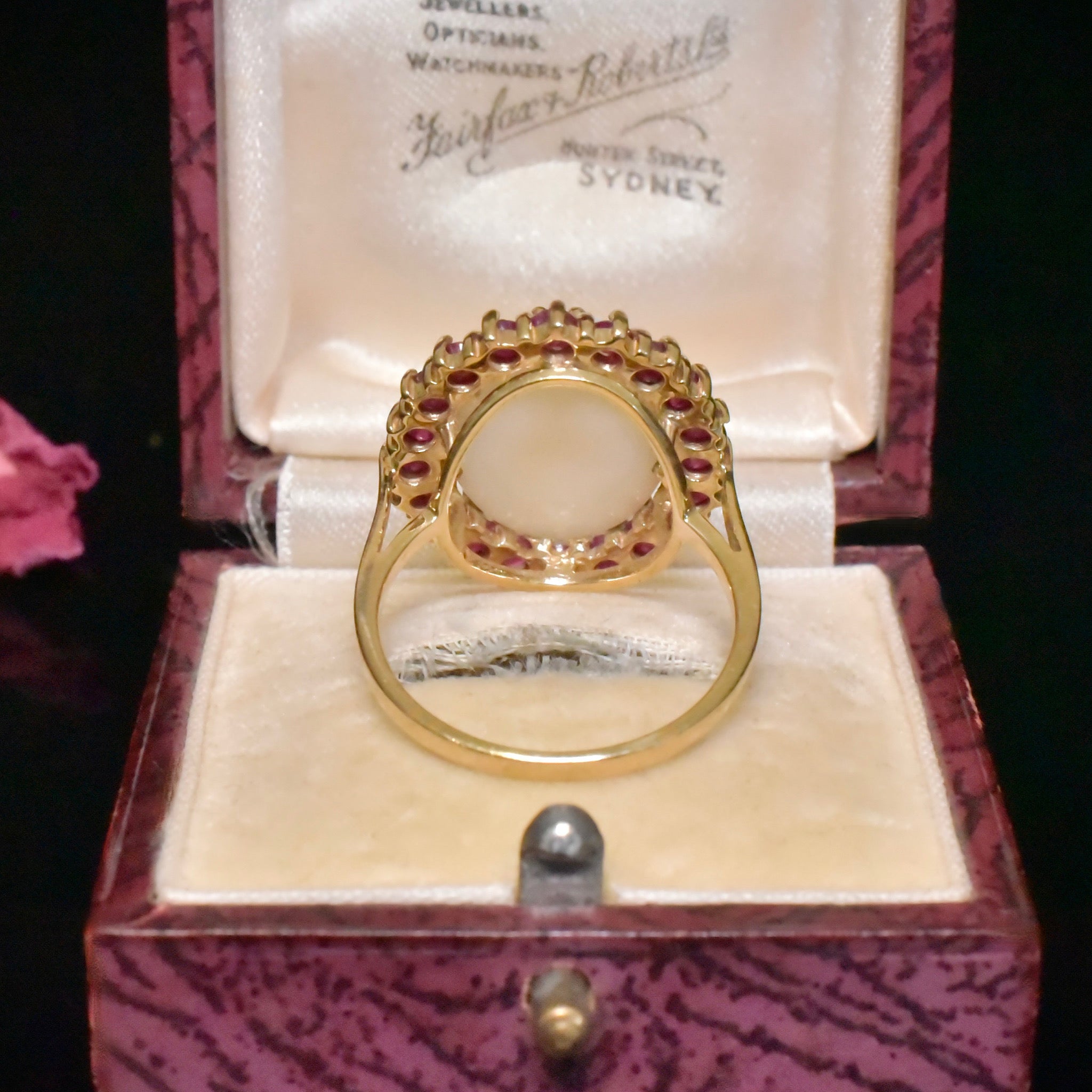 Modern 9ct Yellow Gold Solid White Opal And Ruby Halo Ring