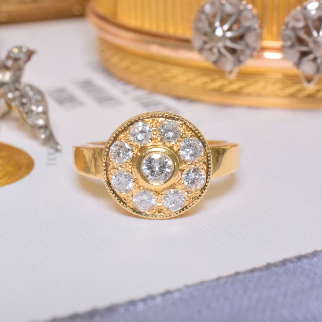 Estate 18ct Yellow Gold And Diamond Halo Ring Accompanied by an old 1996 Valuation for $2,300 AUD