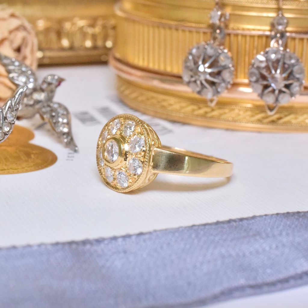 Estate 18ct Yellow Gold And Diamond Halo Ring Accompanied by an old 1996 Valuation for $2,300 AUD