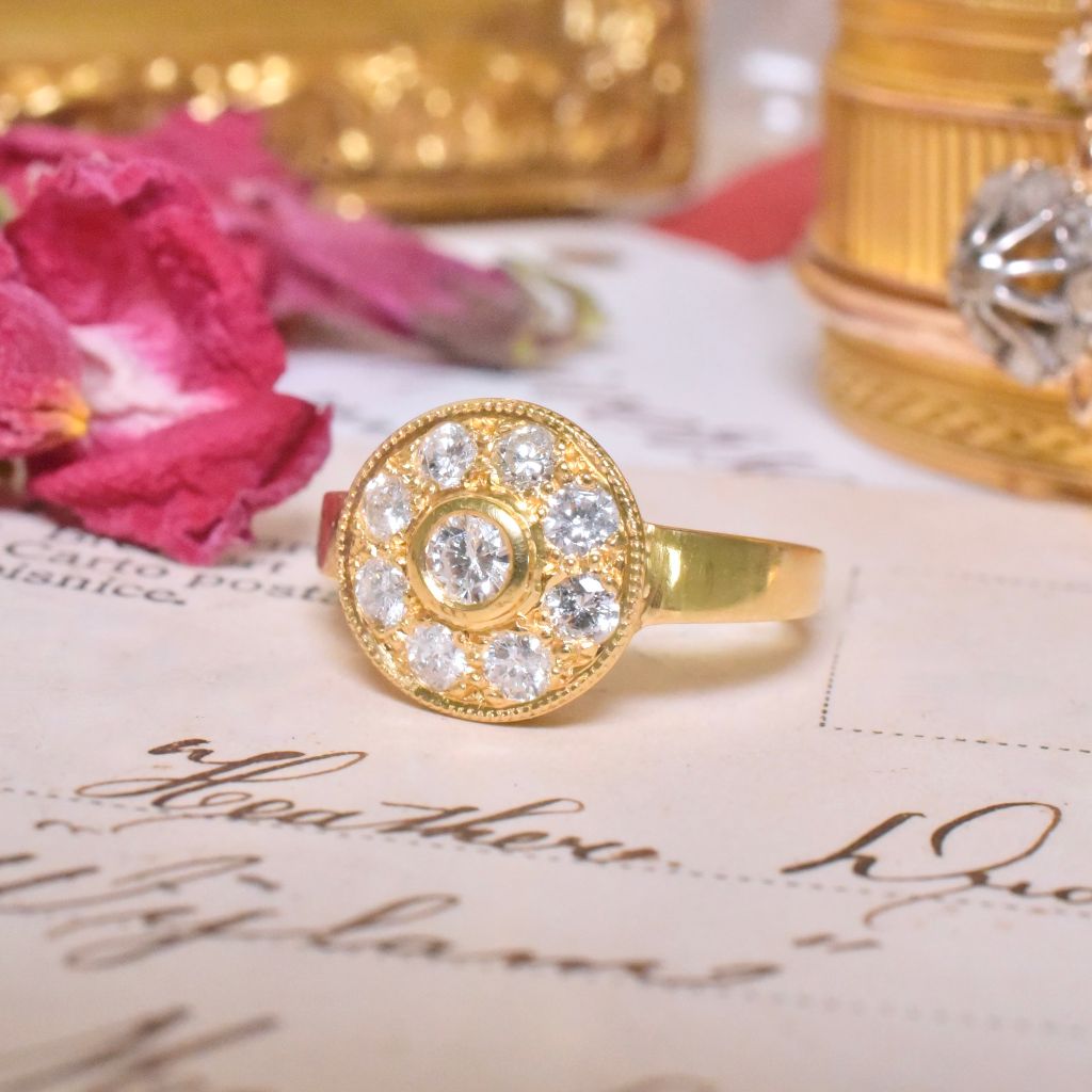 Estate 18ct Yellow Gold And Diamond Halo Ring Accompanied by an old 1996 Valuation for $2,300 AUD