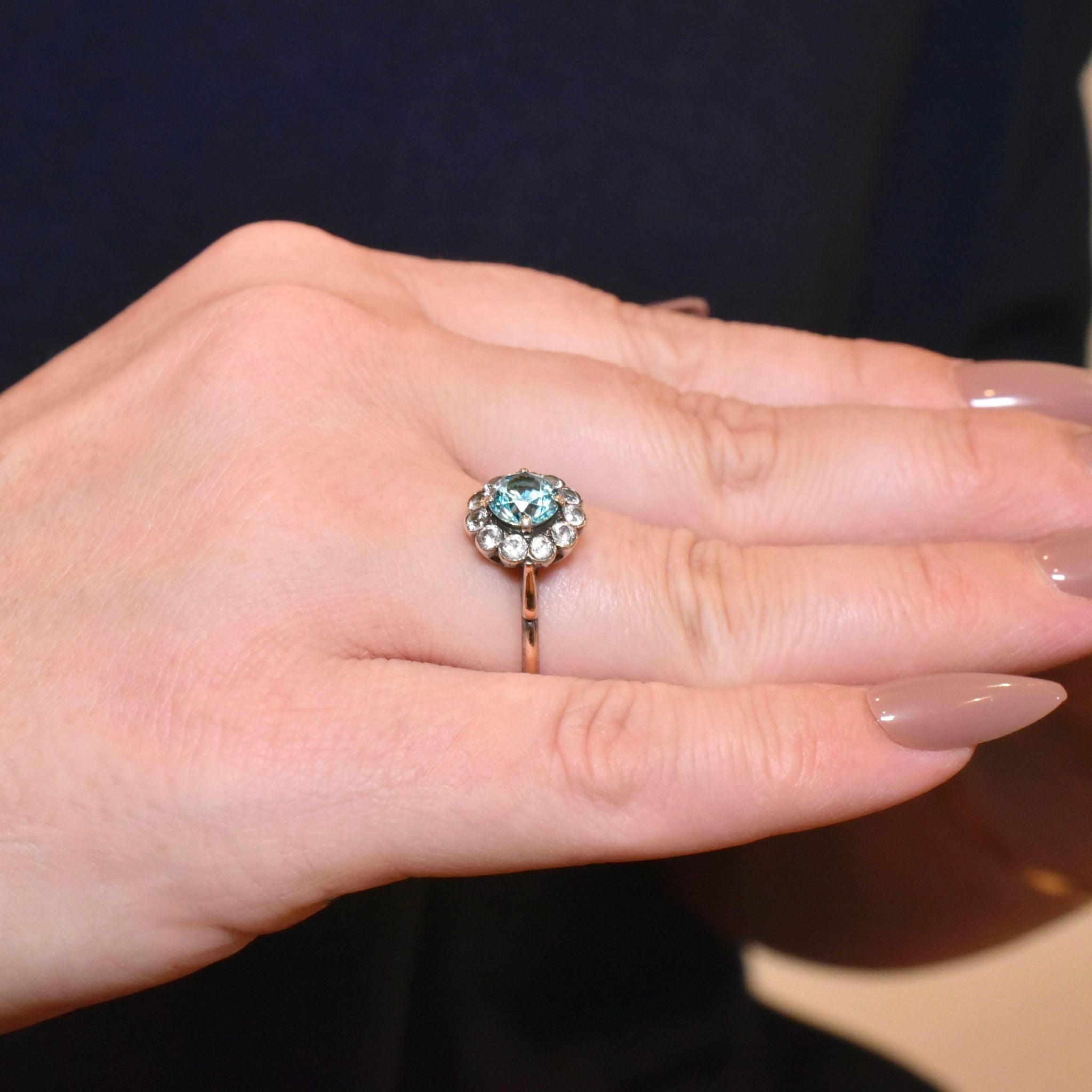 Art Deco Era 9ct Rose Gold Blue Zircon And White Spinel ‘Daisy Halo’ Ring