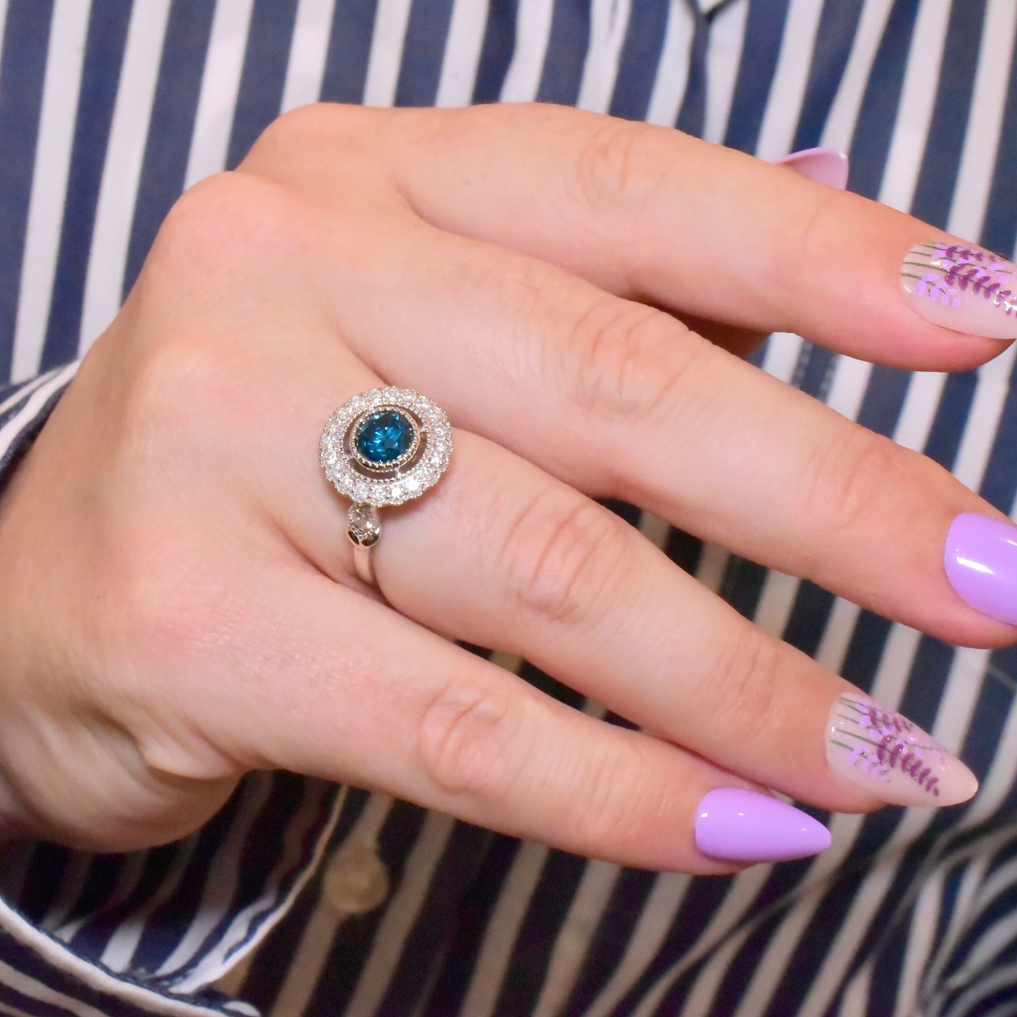 Exquisite 18ct White Gold ‘0.95ct Blue Diamond’ And White Diamond (0.48ct) Halo Ring - Included In Purchase Valuation For $18,600 AUD