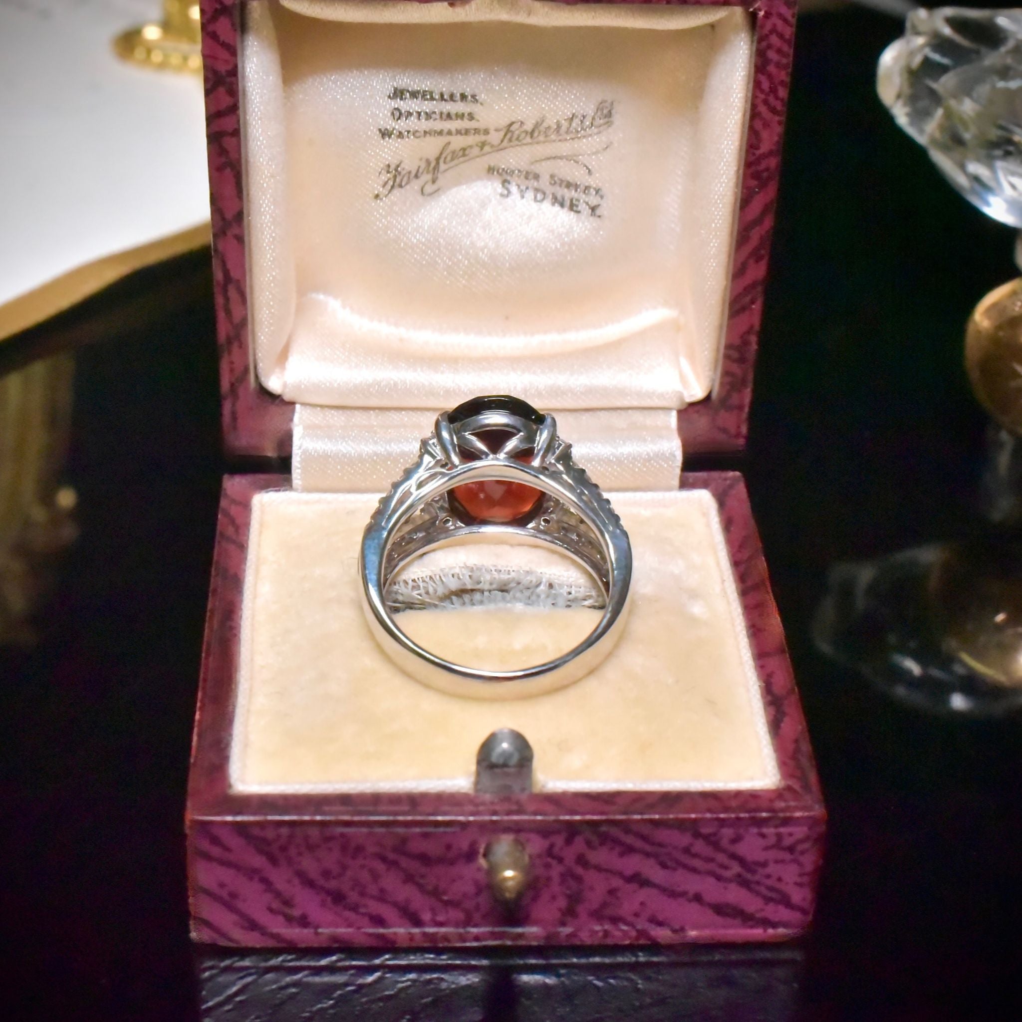 Contemporary 18ct White Gold Almadine Garnet (5.95ct) And Diamond (0.60ct) Ring Included In Purchase Valuation For $7,916 AUD