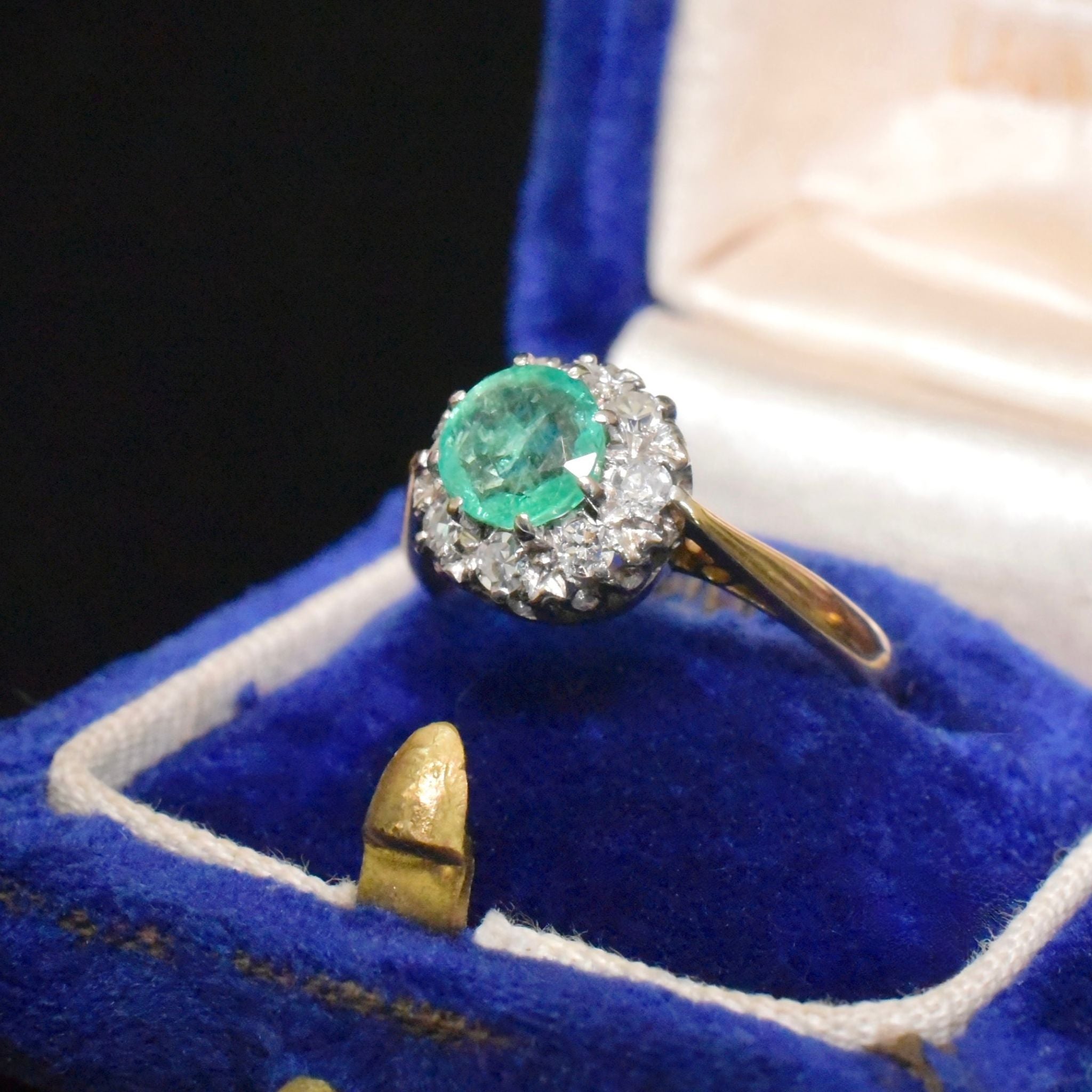 Antique Edwardian 18ct Yellow Gold Emerald And Diamond ‘Daisy’ Halo Ring