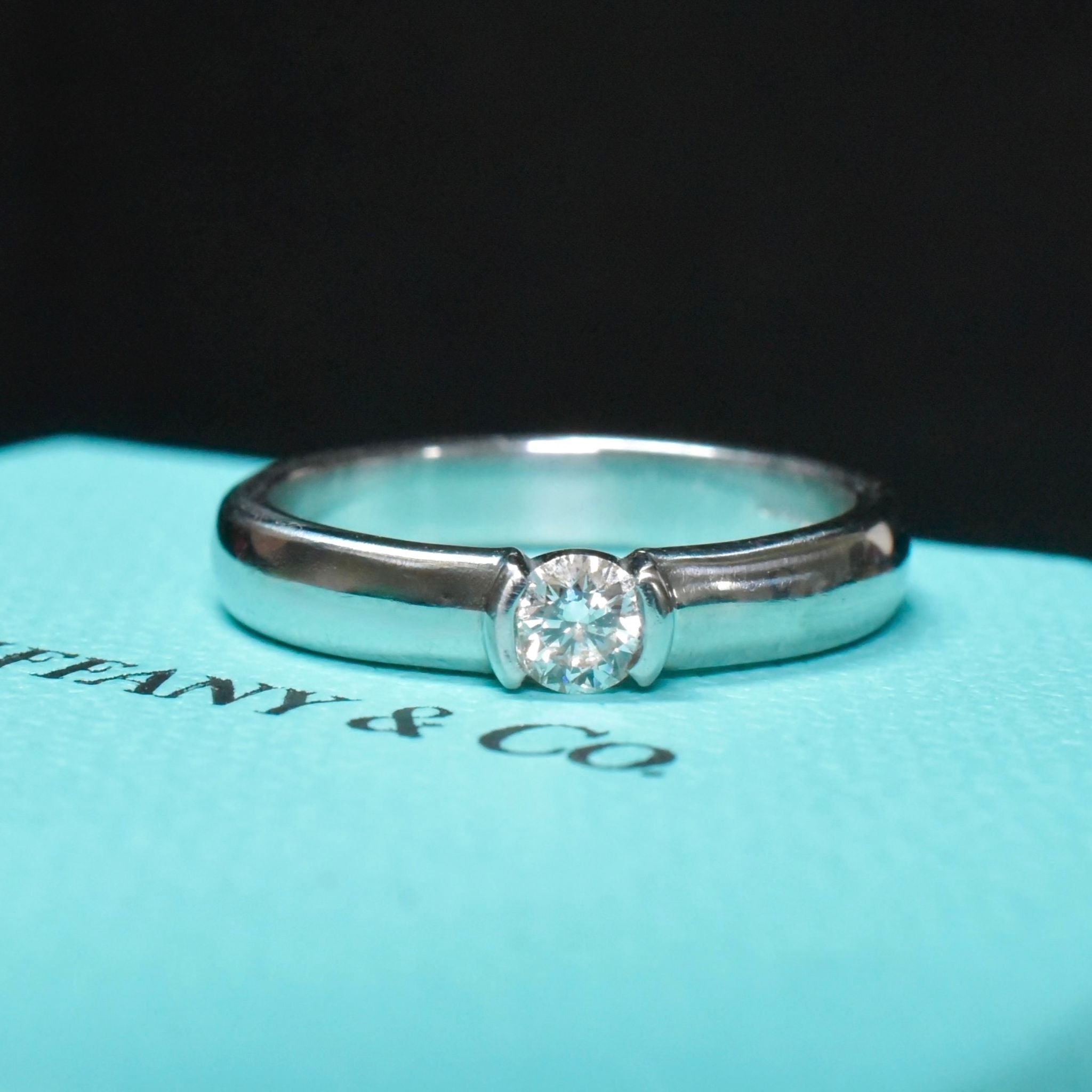 Contemporary Tiffany & Co. Platinum Etoile Solitaire Diamond Ring