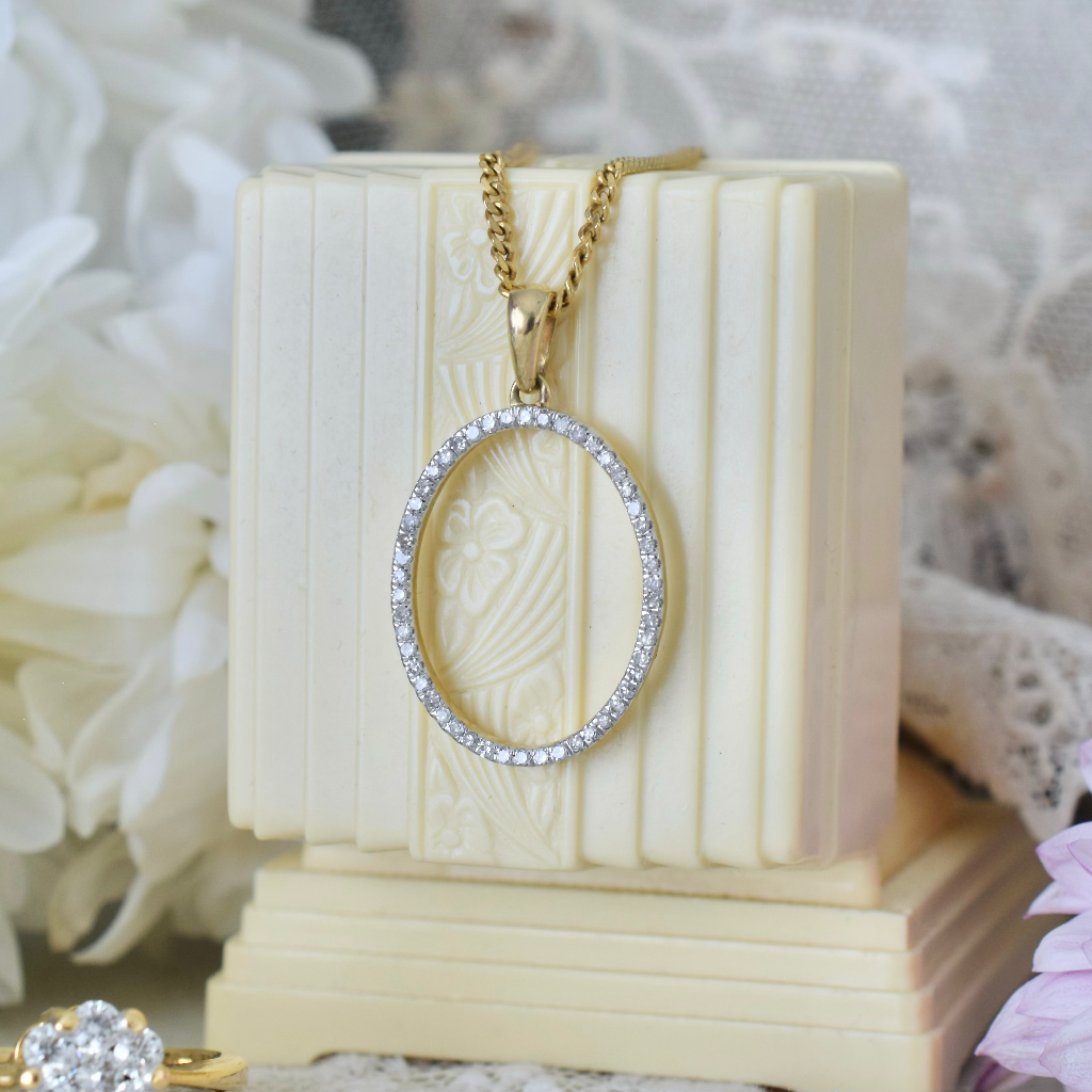 Modern 10ct Yellow Gold Diamond Oval Pendant/Charm