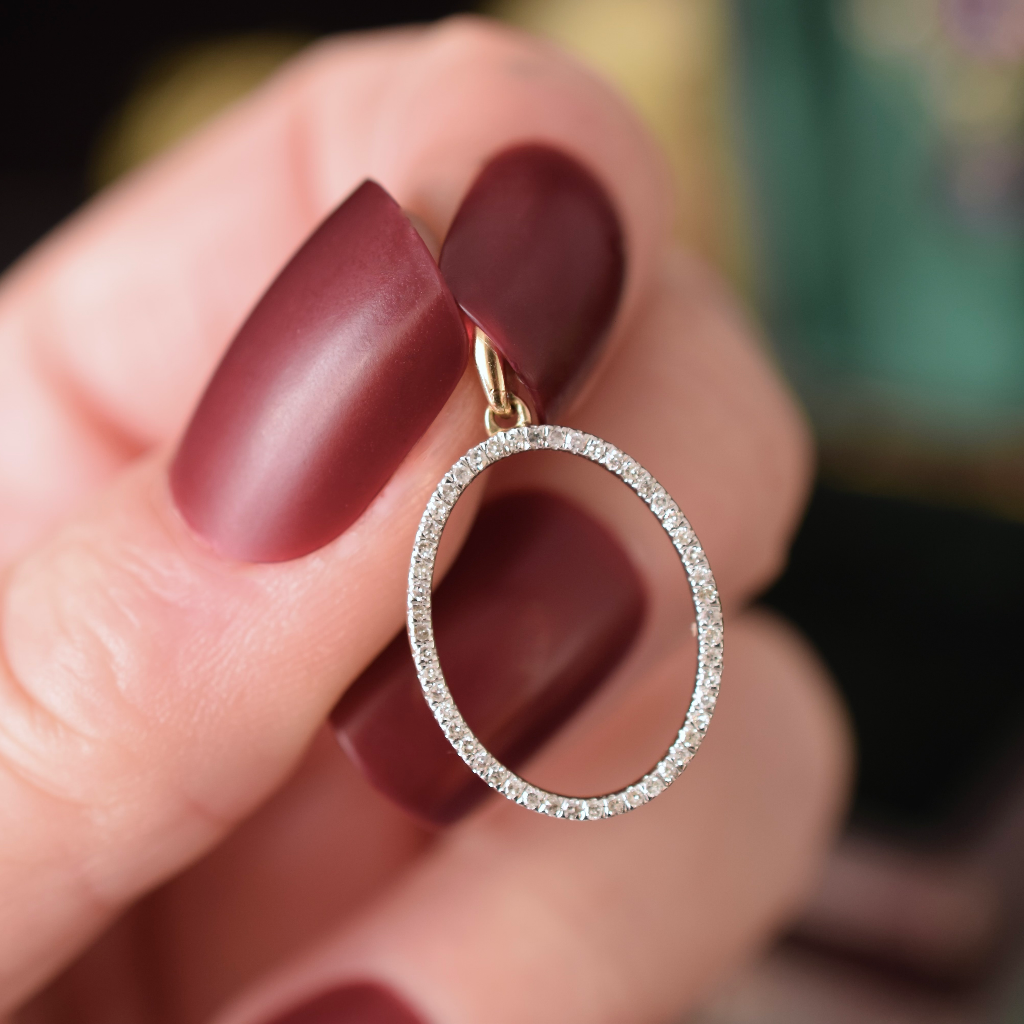 Modern 10ct Yellow Gold Diamond Oval Pendant/Charm