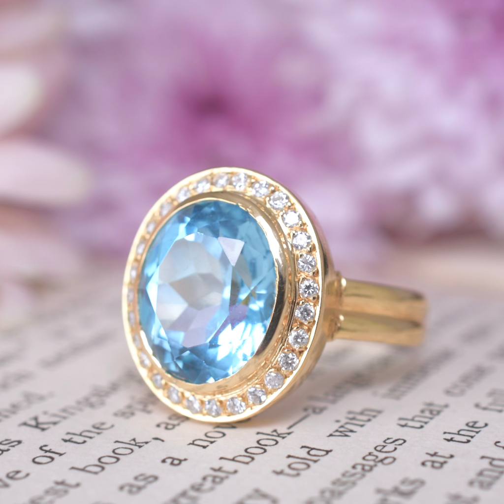 Modern 18ct Yellow Gold Topaz And Diamond Halo Ring Independent Valuation for $4265.00 AUD