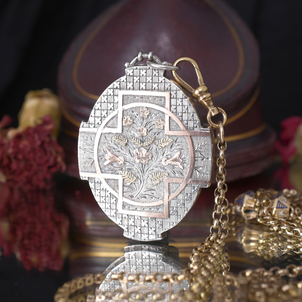 Antique Victorian Aesthetic Era Sterling Silver Locket With Gold Accents Circa 1890