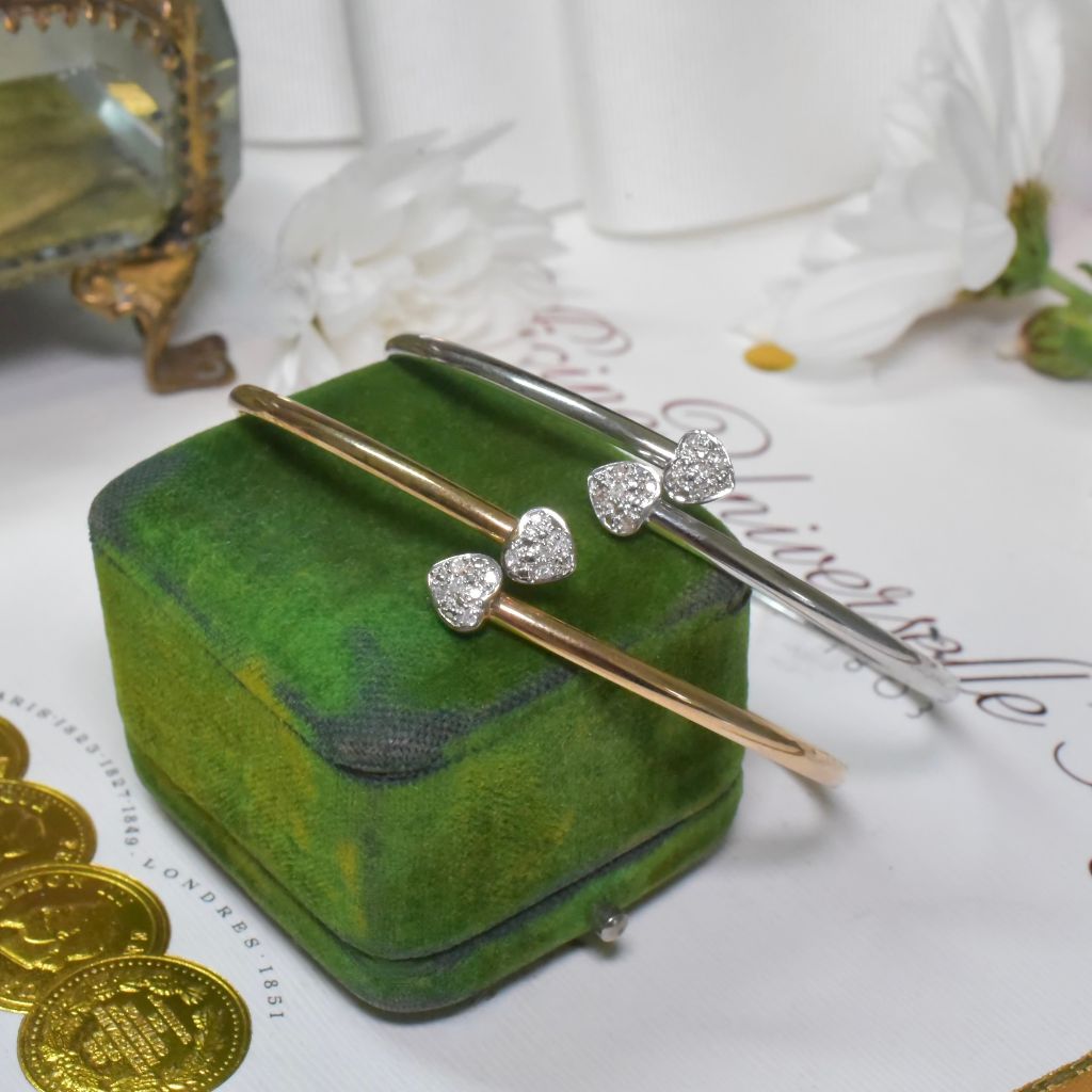 Modern Pair Of 9ct Yellow, And 9ct White Gold And Diamond Heart Bangles