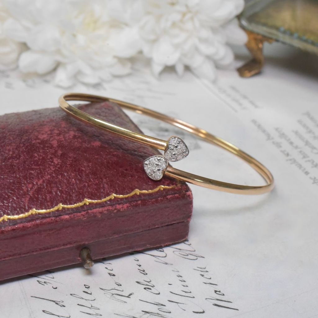 Modern Pair Of 9ct Yellow, And 9ct White Gold And Diamond Heart Bangles