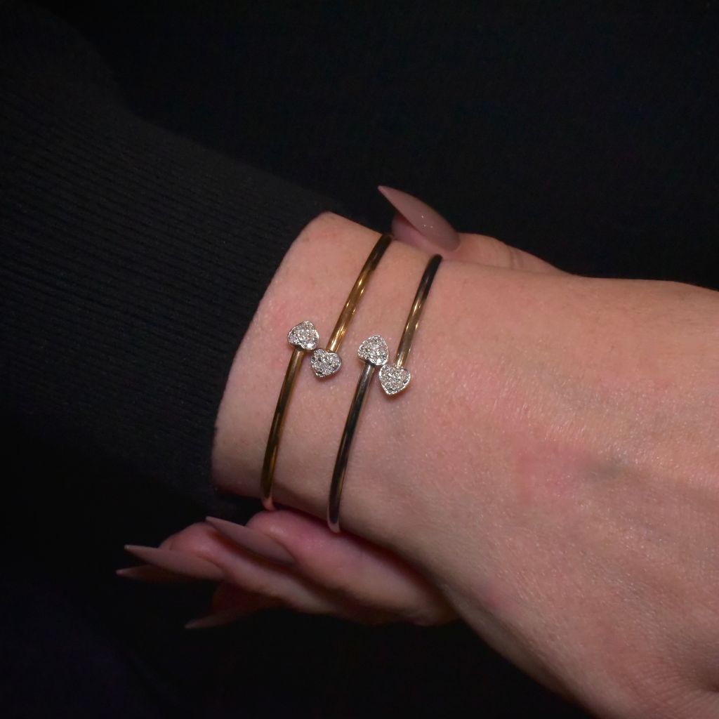 Modern Pair Of 9ct Yellow, And 9ct White Gold And Diamond Heart Bangles