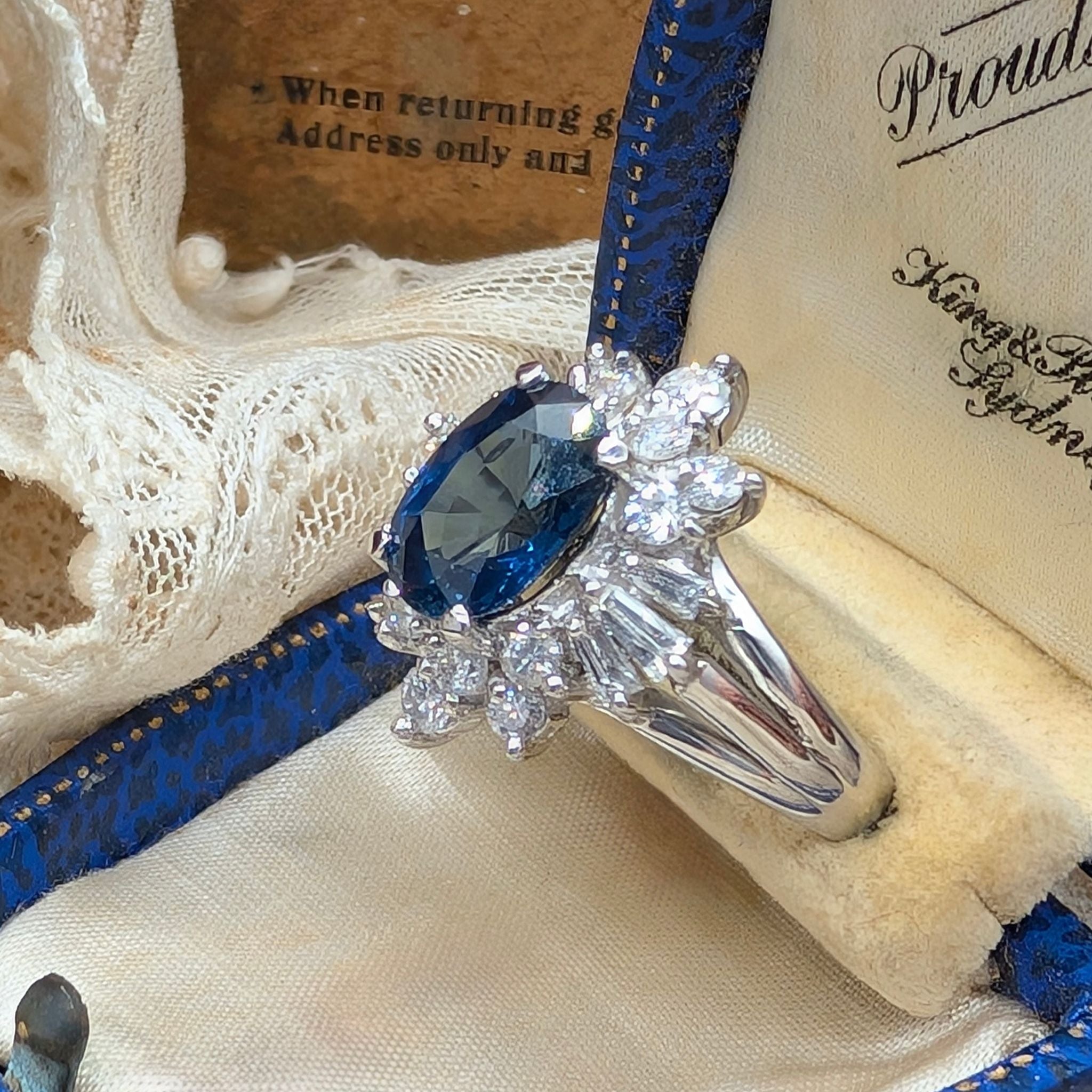 Superb Platinum Sapphire and Diamond Cluster Ring Complete With An Indepedent Gemmological Valuation for $14,380 AUD