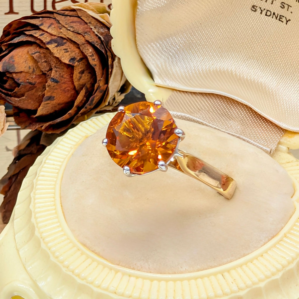 Stunning Contemporary 18ct Yellow And White Gold Orange Zircon 3.46ct Ring Complete With Retail Replacement Valuation for $4100 AUD