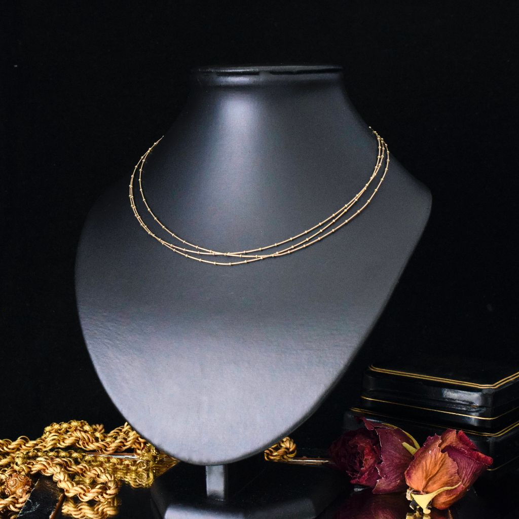 Modern Italian 9ct Yellow Gold Triple Strand Fancy Omega Necklace