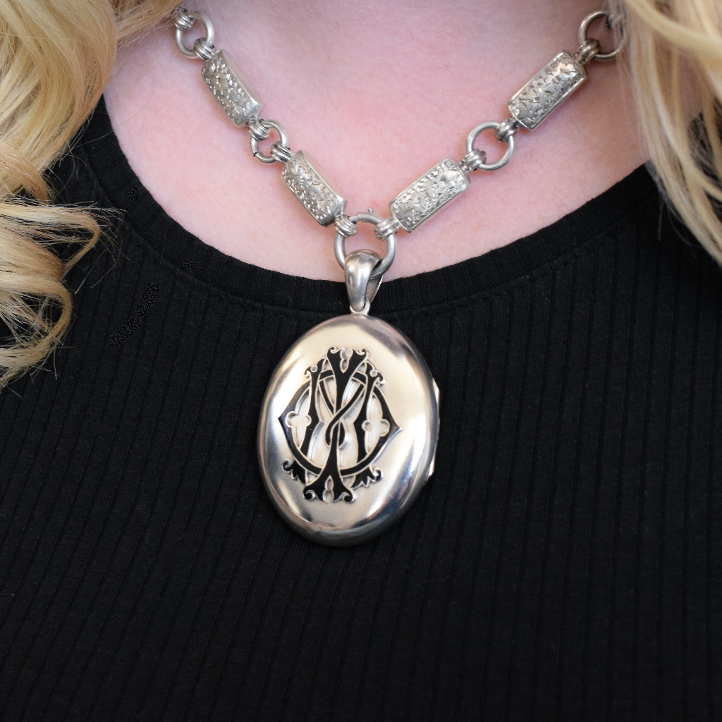 Antique Victorian Sterling Silver ‘In Memory Of’ Enamel Locket and Floral Engraved Bookchain Circa 1890