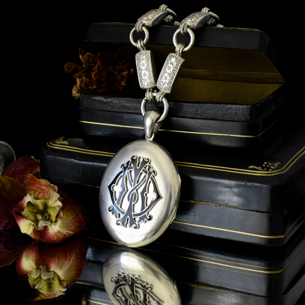 Antique Victorian Sterling Silver ‘In Memory Of’ Enamel Locket and Floral Engraved Bookchain Circa 1890