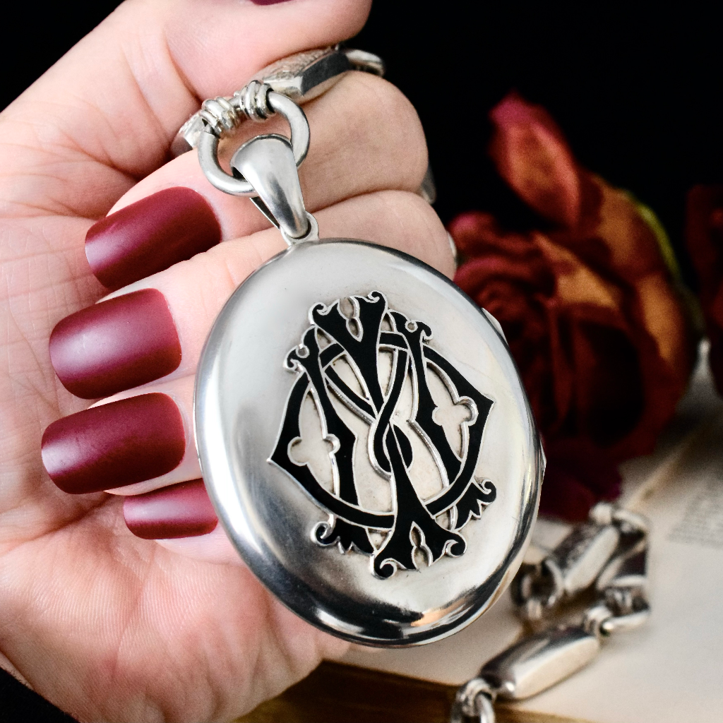 Antique Victorian Sterling Silver ‘In Memory Of’ Enamel Locket and Floral Engraved Bookchain Circa 1890