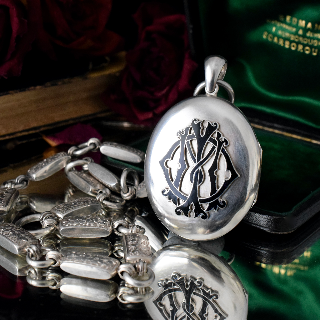Antique Victorian Sterling Silver ‘In Memory Of’ Enamel Locket and Floral Engraved Bookchain Circa 1890