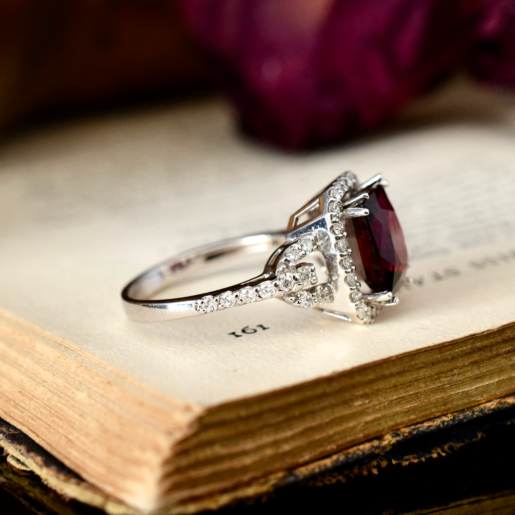 Modern 18ct White Gold Rhodolite Garnet And Diamond Halo Ring Independent Insurance Valuation For $4,400 AUD