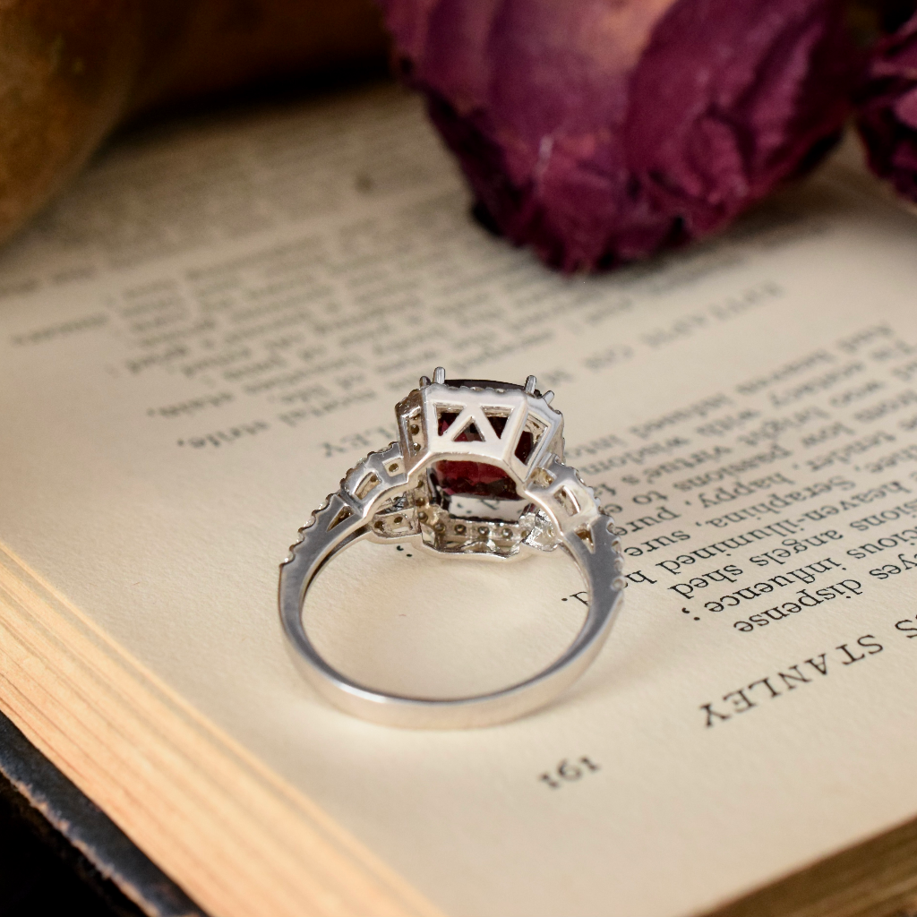 Modern 18ct White Gold Rhodolite Garnet And Diamond Halo Ring Independent Insurance Valuation For $4,400 AUD