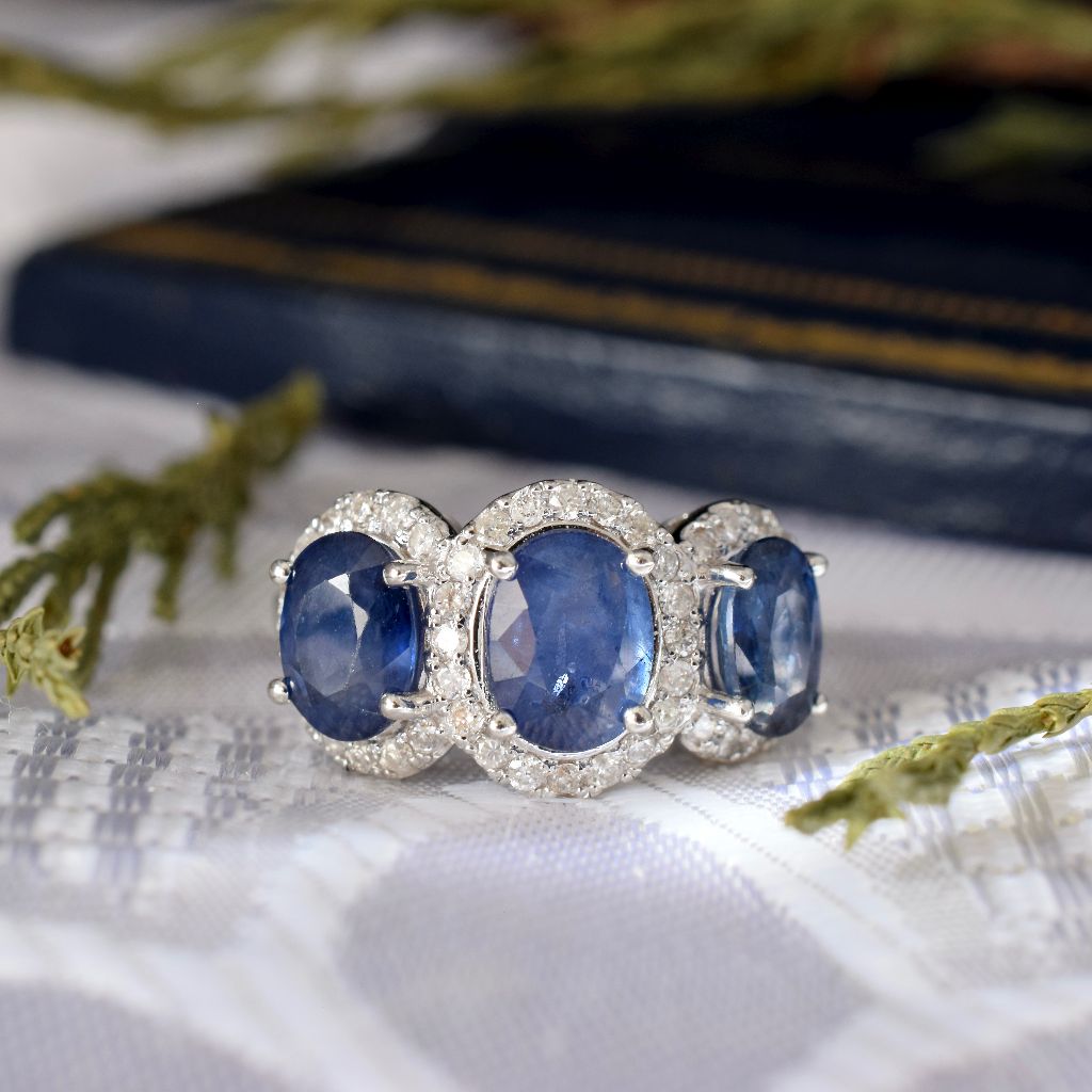 Modern 18ct White Gold Sapphire Diamond Ring