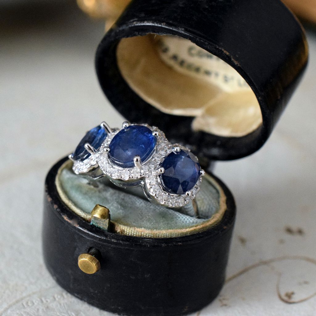 Modern 18ct White Gold Sapphire Diamond Ring