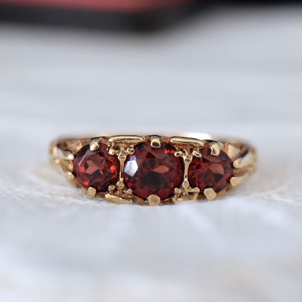 Charming 9ct Yellow Gold Three Garnet Trilogy Ring