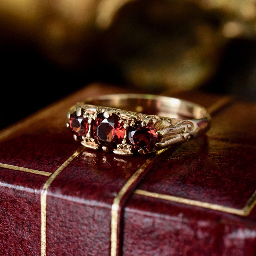 Charming 9ct Yellow Gold Three Garnet Trilogy Ring