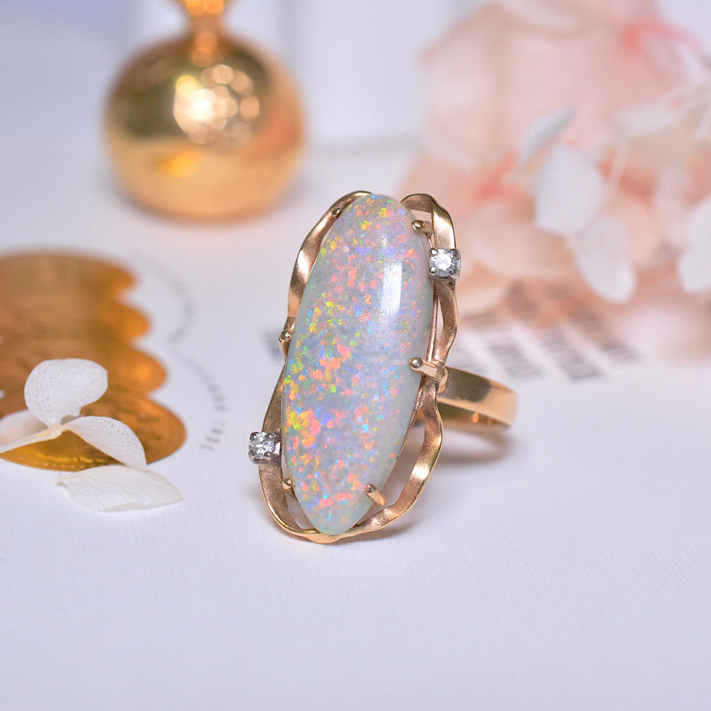 Contemporary 18ct Yellow Gold Semi Black Solid Opal And Diamond Ring Independent valuation included for $10,000 AUD