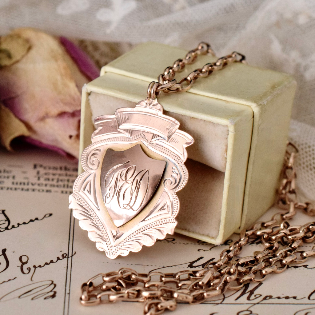 Rose quartz gold on sale shield necklace