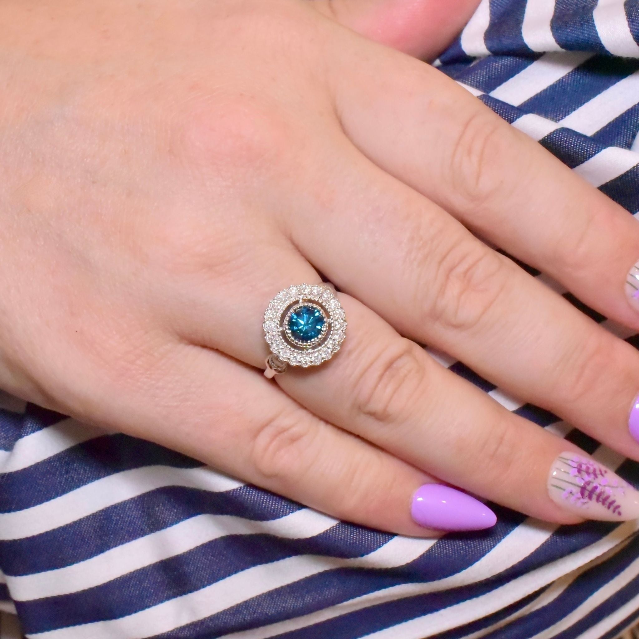 Exquisite 18ct White Gold ‘0.95ct Blue Diamond’ And White Diamond (0.48ct) Halo Ring -  Included In Purchase Valuation For $18,600 AUD