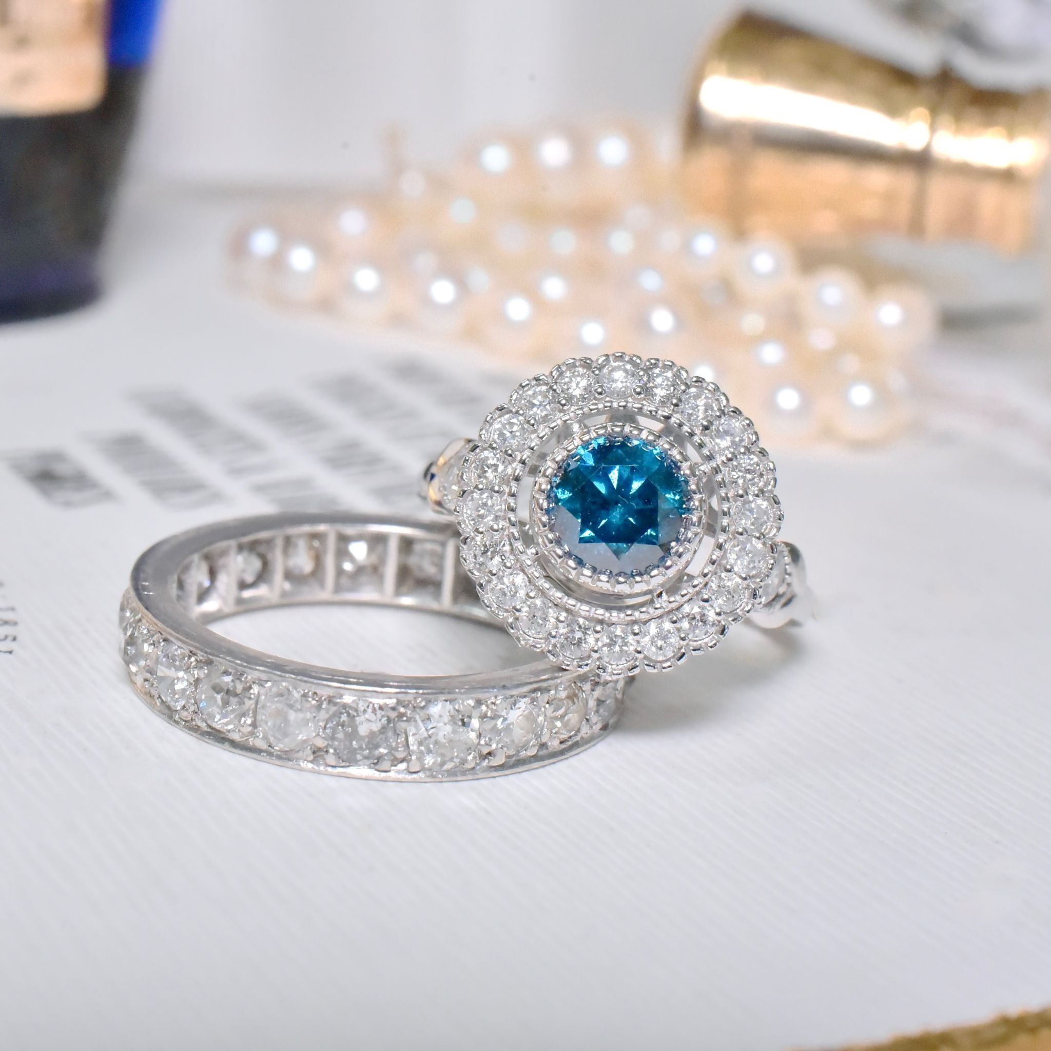 Exquisite 18ct White Gold ‘0.95ct Blue Diamond’ And White Diamond (0.48ct) Halo Ring -  Included In Purchase Valuation For $18,600 AUD