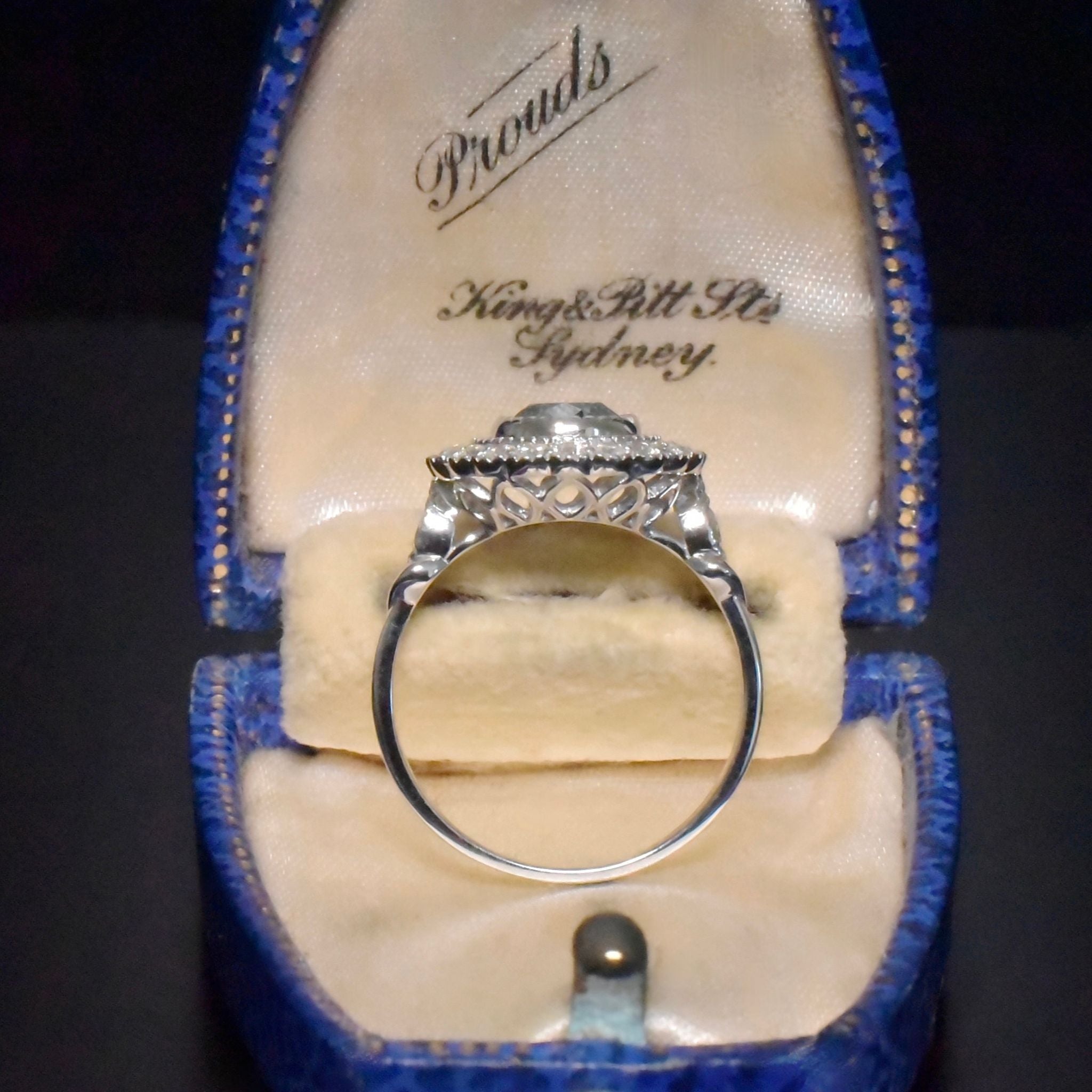 Exquisite 18ct White Gold ‘0.95ct Blue Diamond’ And White Diamond (0.48ct) Halo Ring -  Included In Purchase Valuation For $18,600 AUD