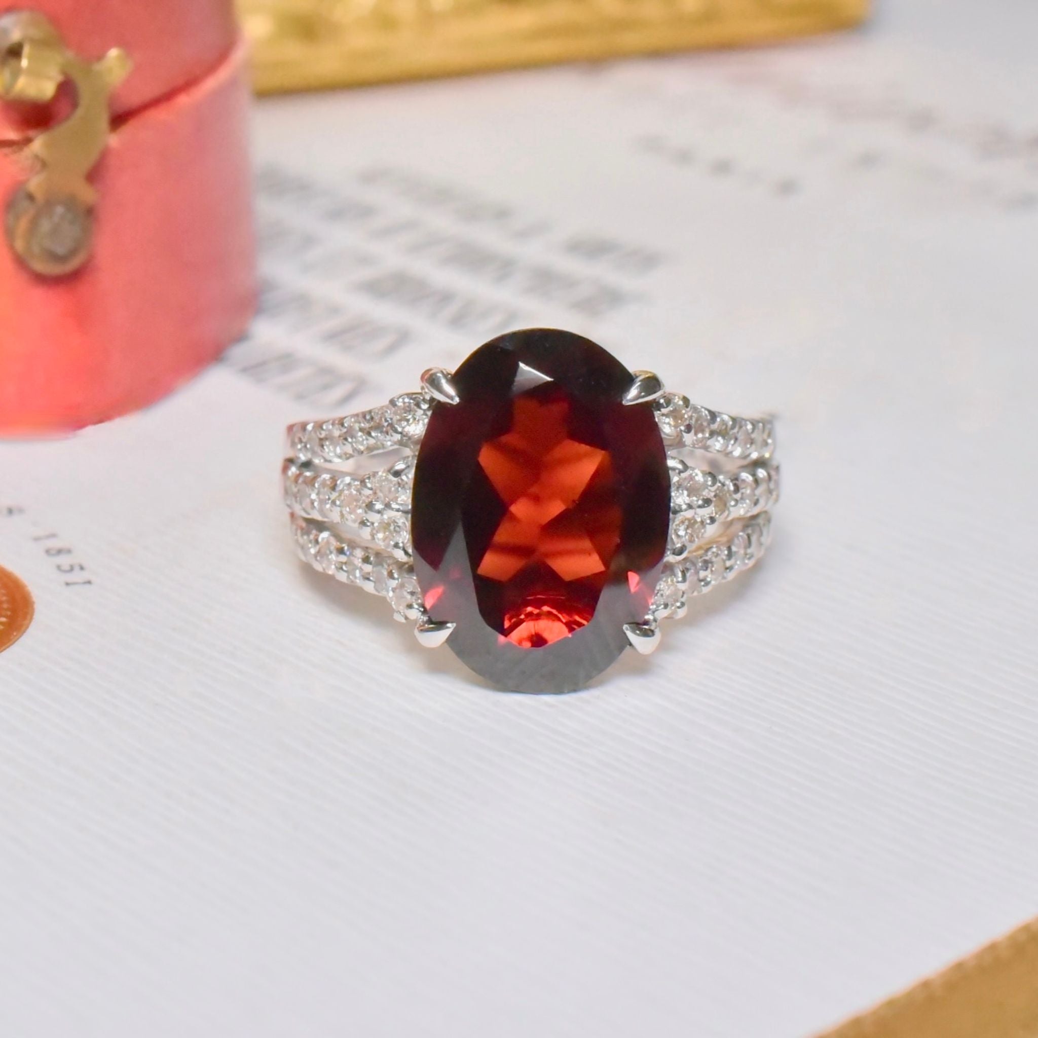 Contemporary 18ct White Gold Almadine Garnet (5.95ct) And Diamond (0.60ct) Ring Included In Purchase Valuation For $7,916 AUD