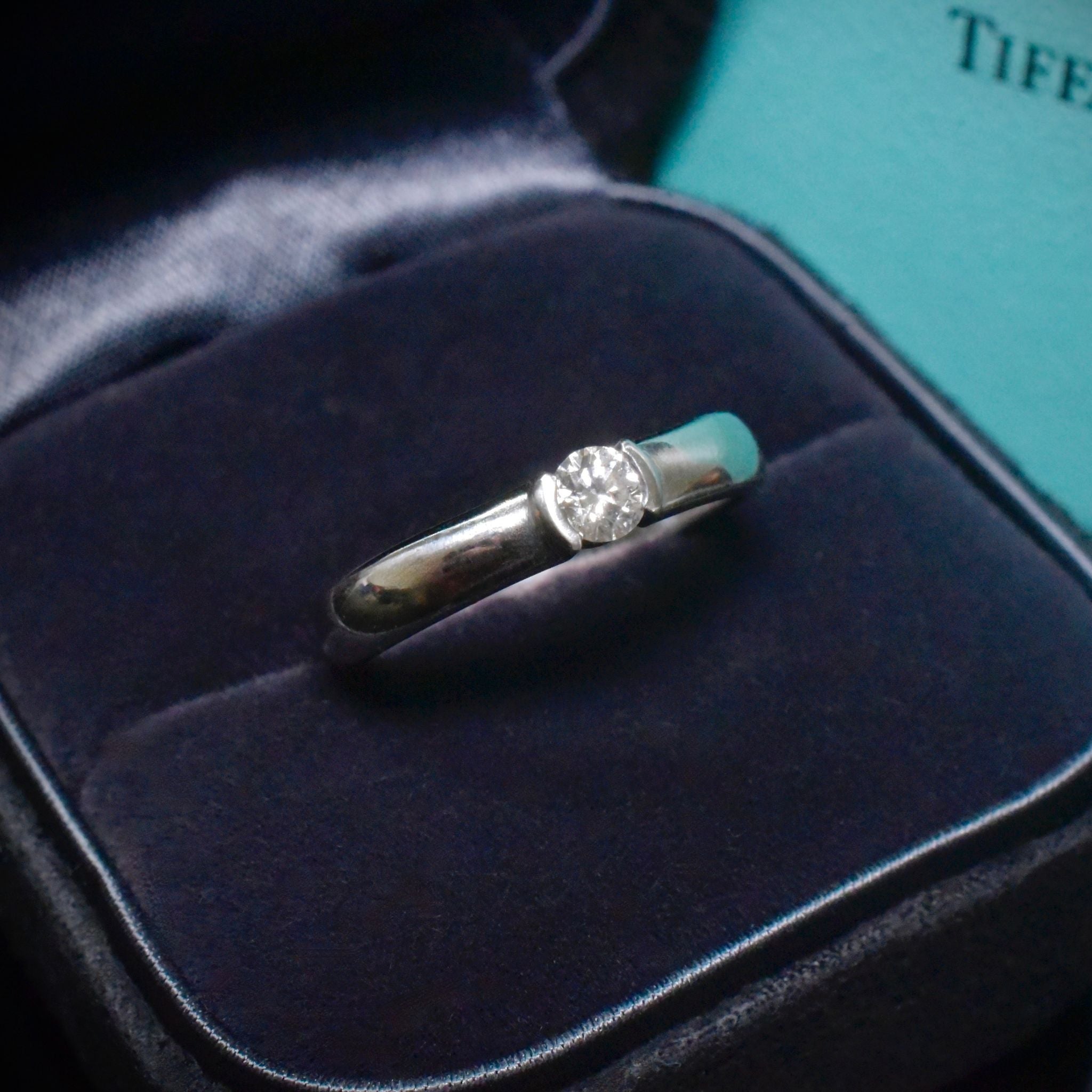 Contemporary Tiffany & Co. Platinum Etoile Solitaire Diamond Ring