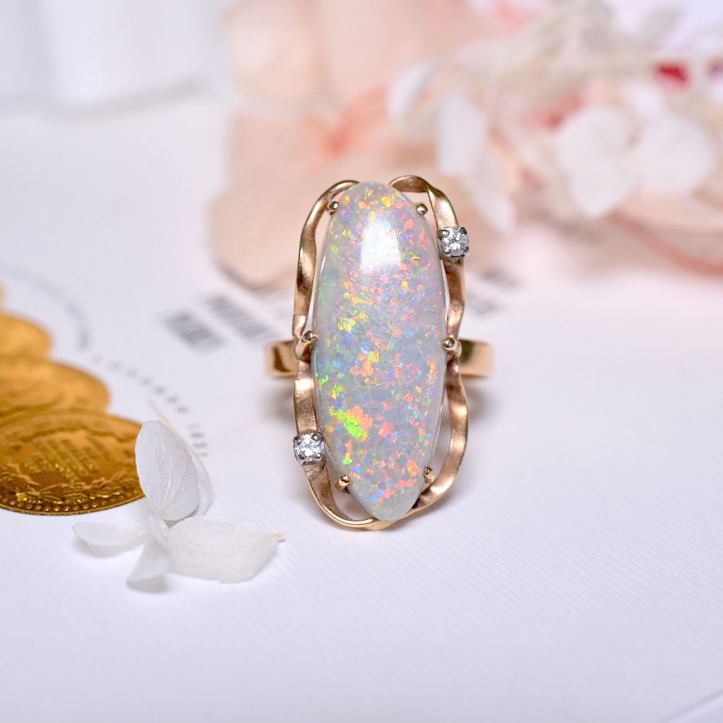 Contemporary 18ct Yellow Gold Semi Black Solid Opal And Diamond Ring Independent valuation included for $10,000 AUD