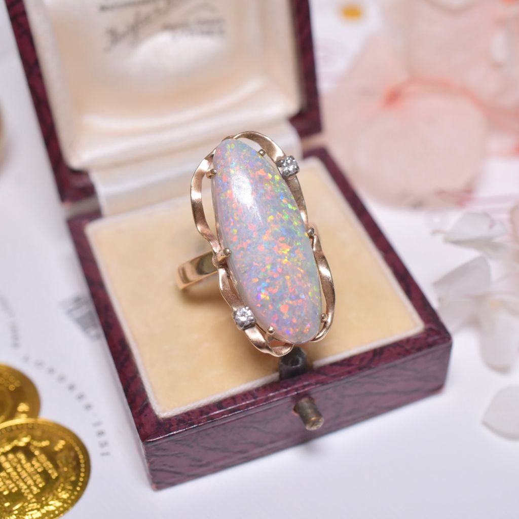 Contemporary 18ct Yellow Gold Semi Black Solid Opal And Diamond Ring Independent valuation included for $10,000 AUD