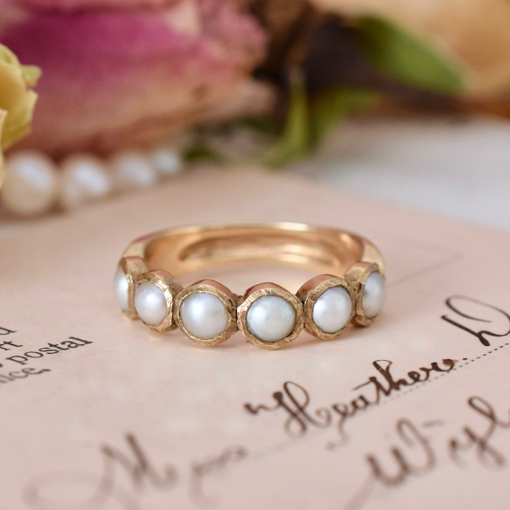 Antique: A Pearl Ring in 18 ct Gold, Half-Hoop Stacker