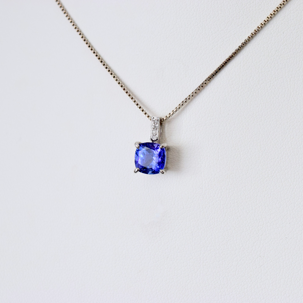 Modern 9ct White Gold Tanzanite And Diamond Pendant