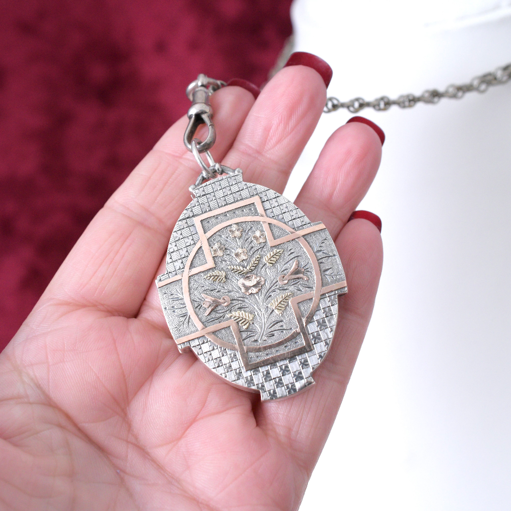 Antique Victorian Aesthetic Era Sterling Silver Locket With Gold Accents Circa 1890