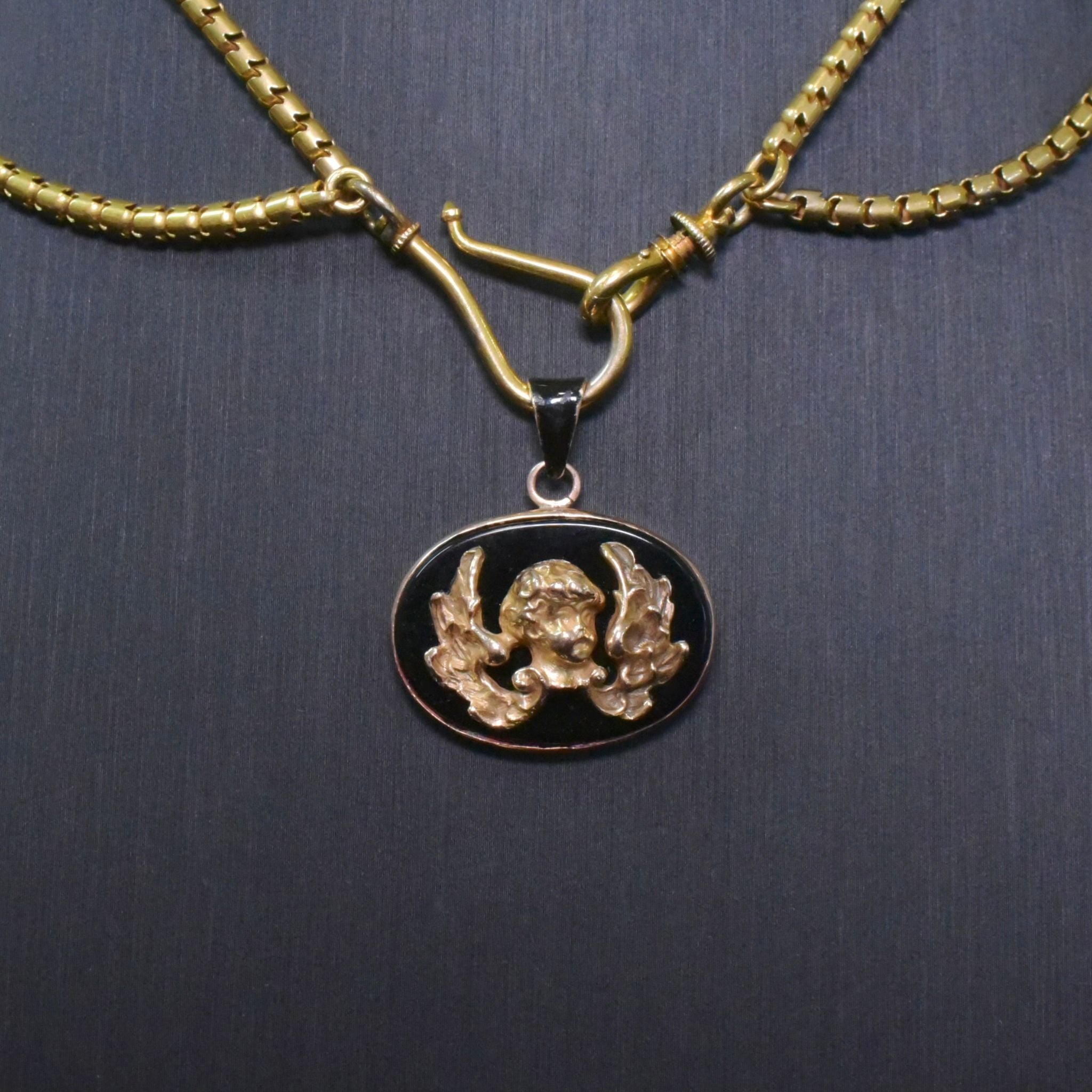 Antique Victorian 15ct Rose Gold And Onyx ‘Winged Cherub’ Pendant Circa 1890