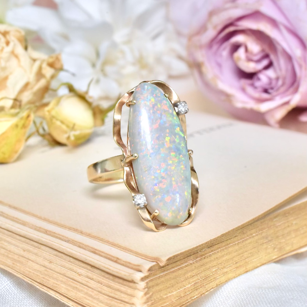 Contemporary 18ct Yellow Gold Semi Black Solid Opal And Diamond Ring Independent valuation included for $10,000 AUD