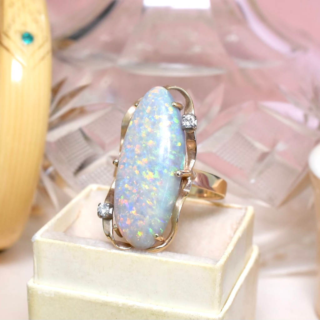 Contemporary 18ct Yellow Gold Semi Black Solid Opal And Diamond Ring Independent valuation included for $10,000 AUD