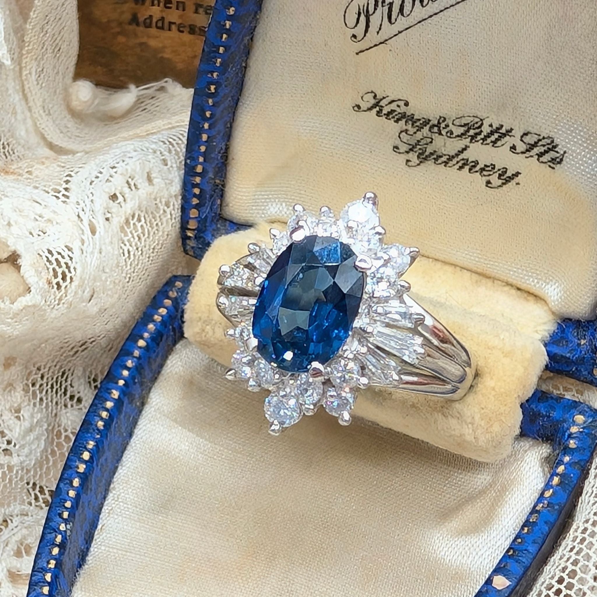 Superb Platinum Sapphire and Diamond Cluster Ring Complete With An Indepedent Gemmological Valuation for $14,380 AUD 
