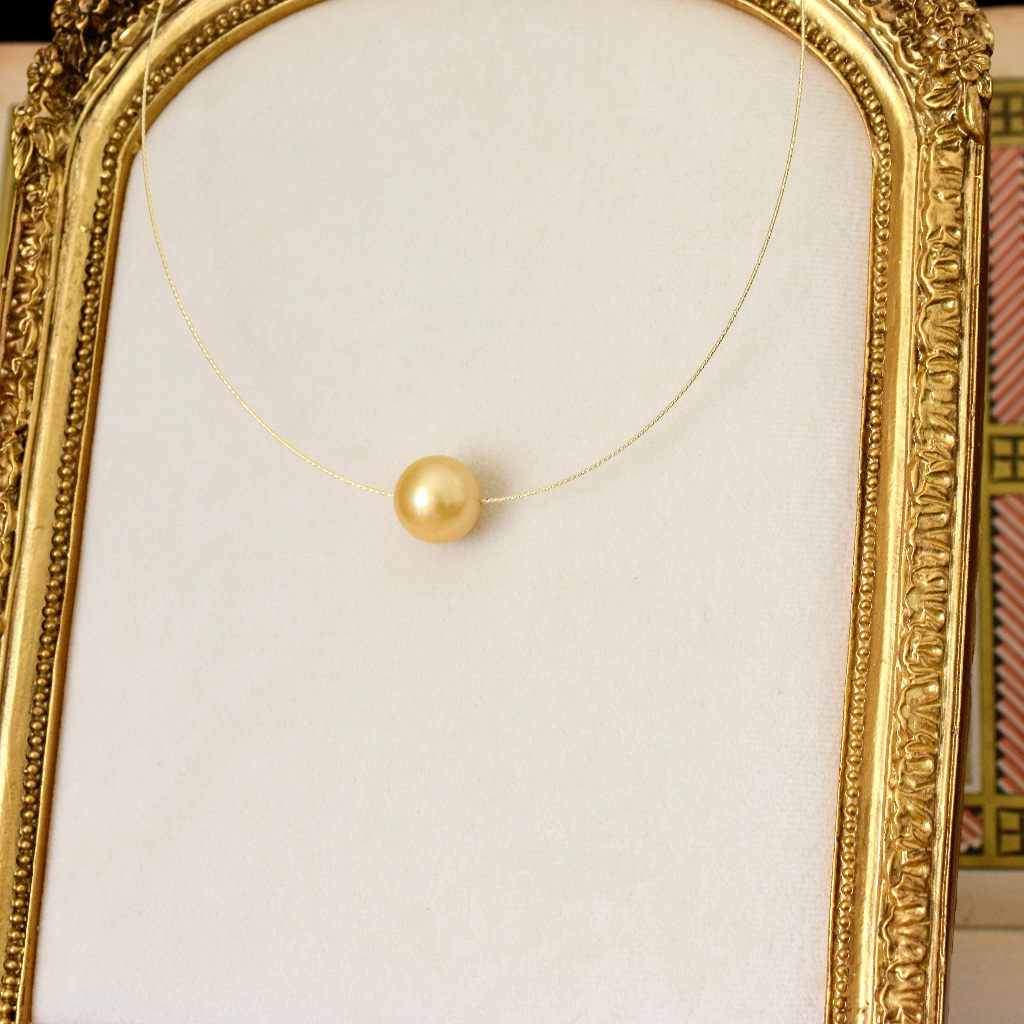 Modern 18ct Yellow Gold Omega Chain And Golden South Sea “Floating’ Pearl Necklace