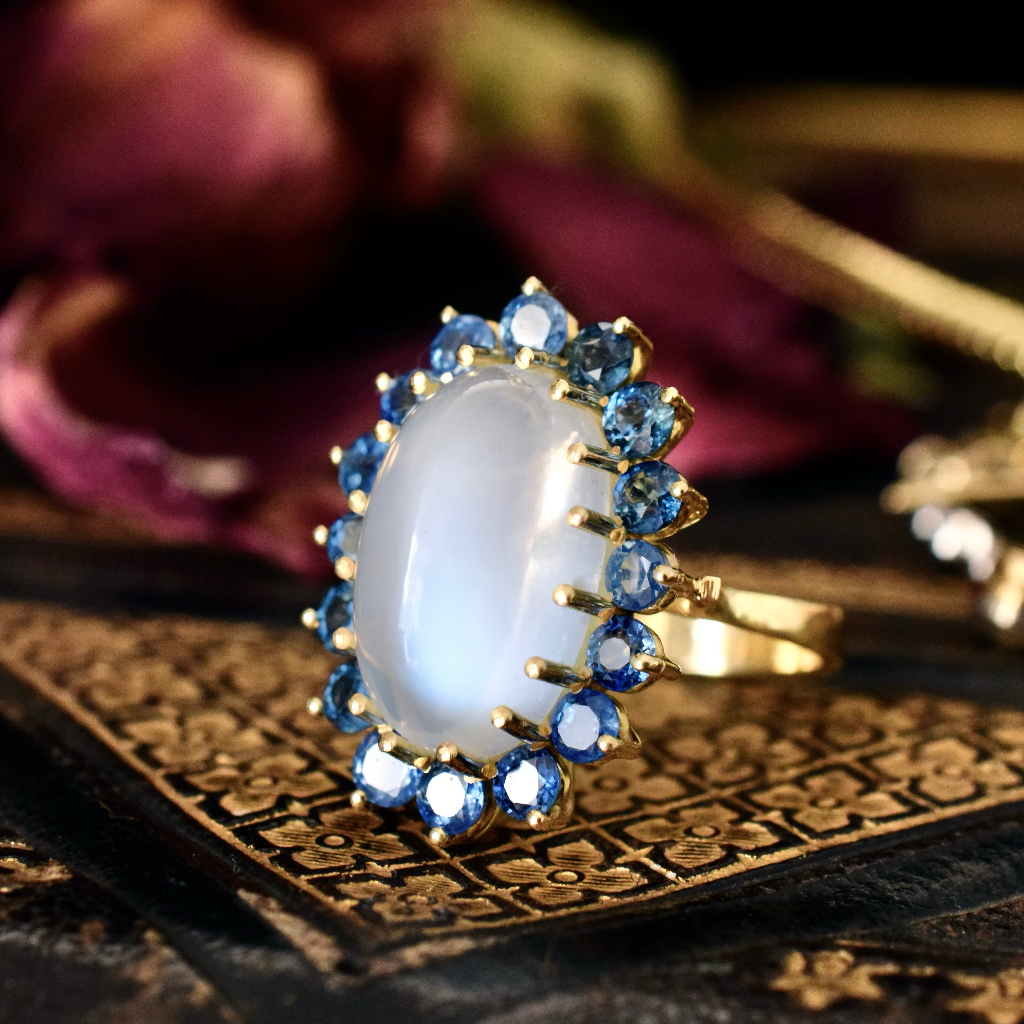 Modern 18ct Yellow Gold Moonstone And Sapphire Ring Independent Insurance/Retail Replacement Valuation Included For $5,250 AUD