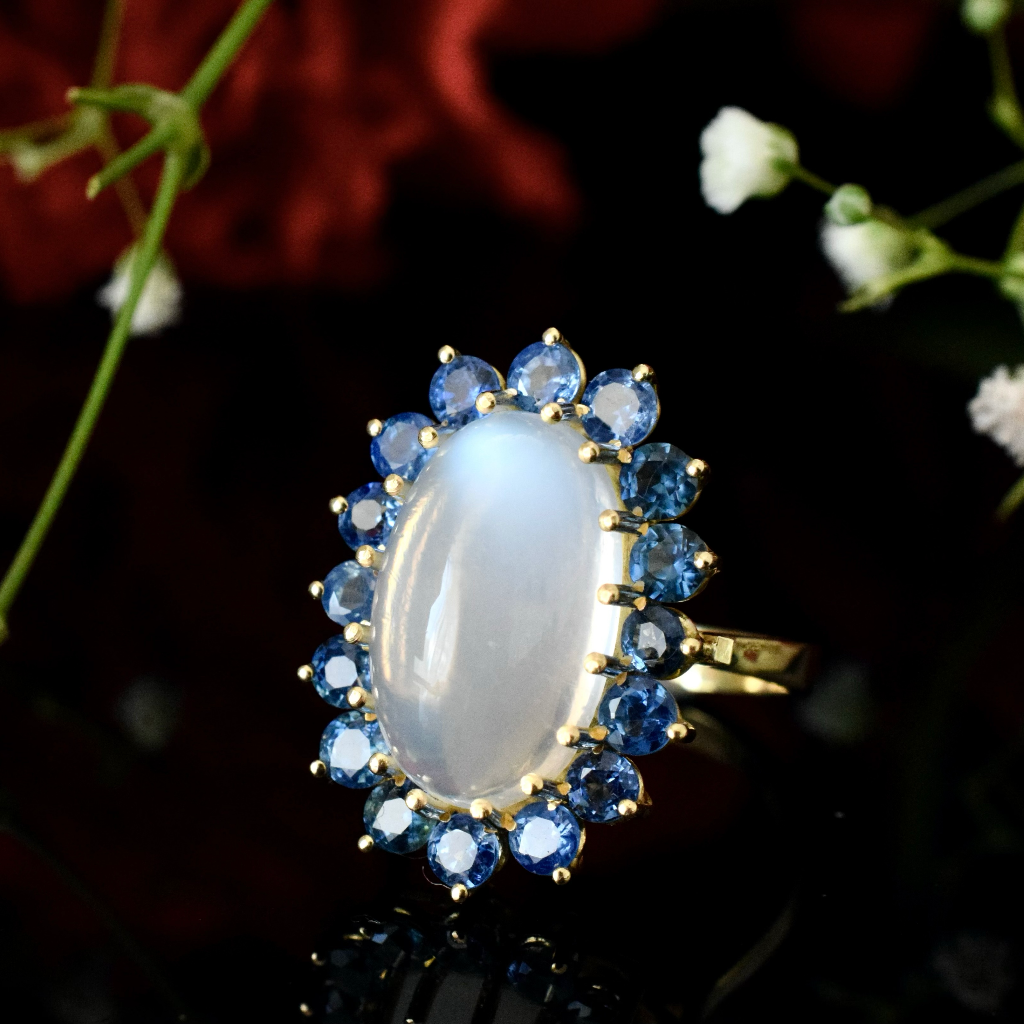 Modern 18ct Yellow Gold Moonstone And Sapphire Ring Independent Insurance/Retail Replacement Valuation Included For $5,250 AUD