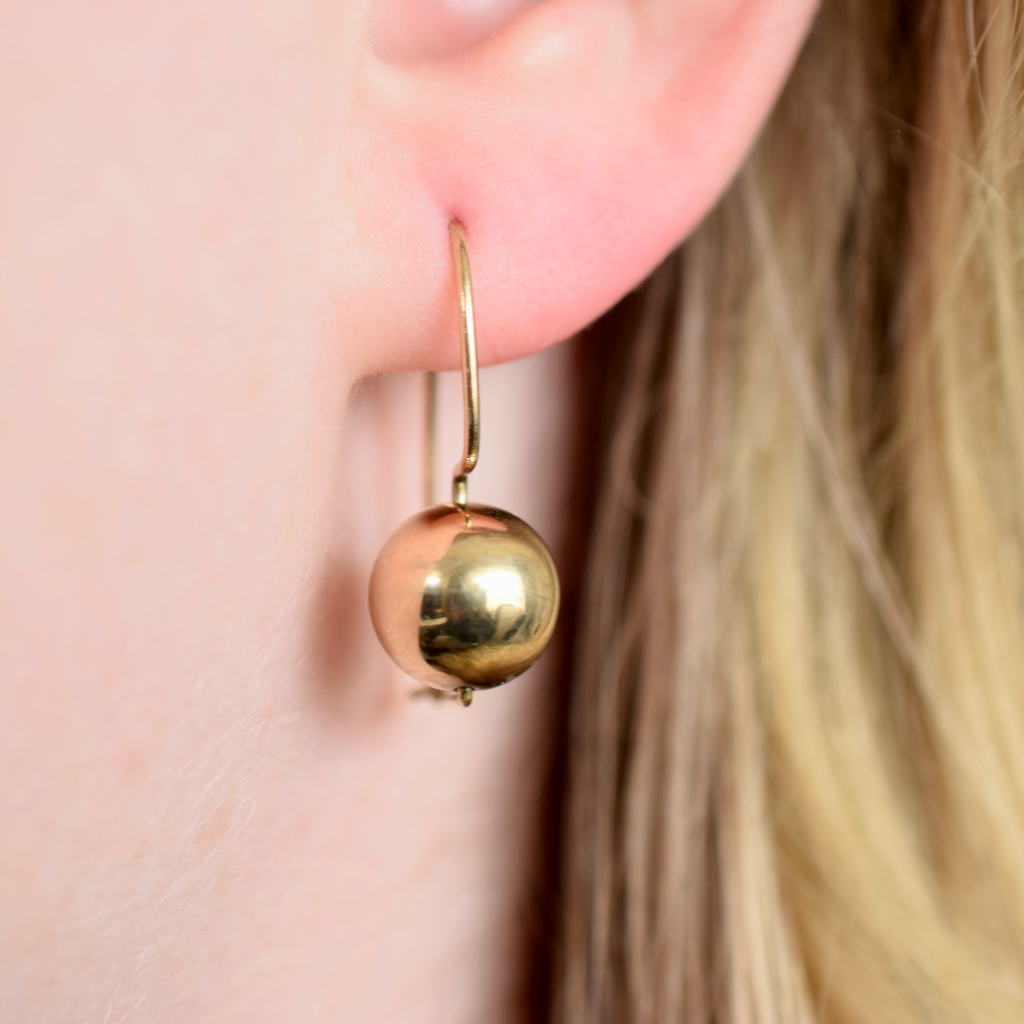 Gold euro shop ball drop earrings