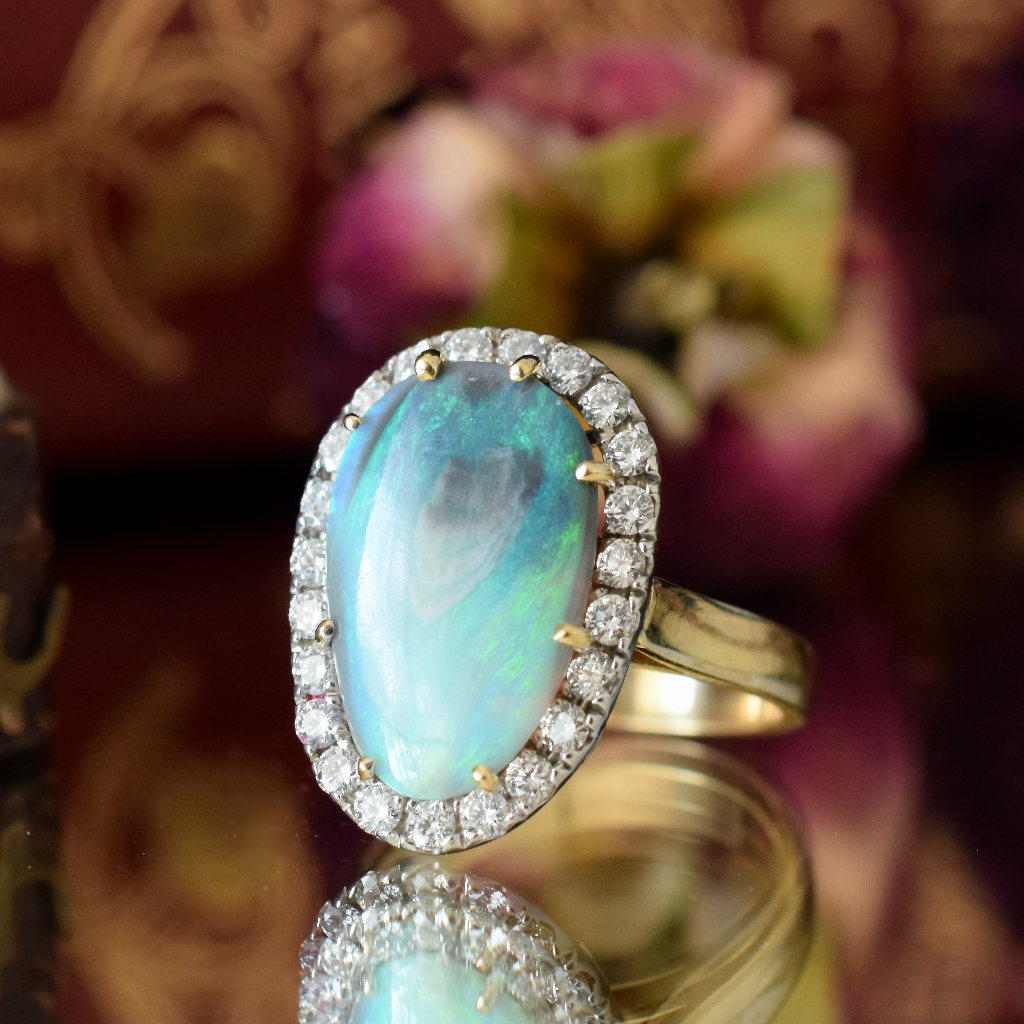 Modern 18ct Yellow Gold Solid Opal and Diamond Ring Independent Valuation Included For $4,500 AUD